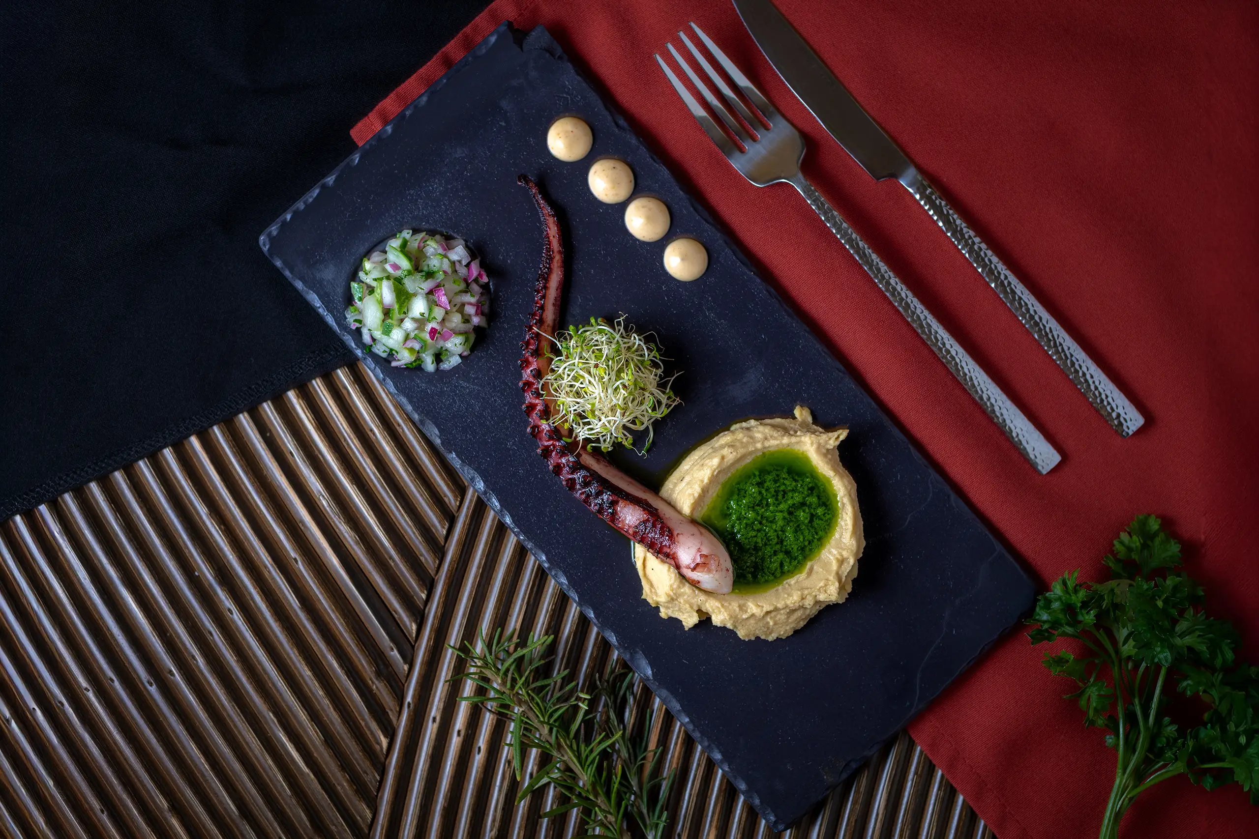 Michelin style octopus plate, 5-star culinary experience.