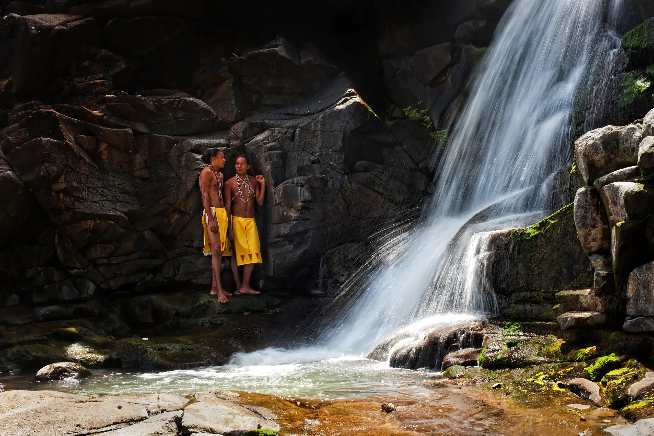 Young Kalinago men, Dominica, eastern Caribbean. Lifestyle photography.